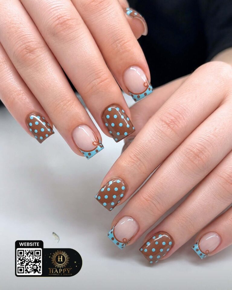 Square nails with blue and brown French tips and polka dots